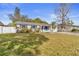 Lovely one-story home with blue shutters, lush landscaping, and a charming curb appeal at 2819 47Th S Ave, St Petersburg, FL 33712