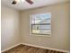 Bright bedroom with vinyl flooring and window at 3241 Rogue St, North Port, FL 34291