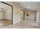 Sunroom with tile floors and sliding glass doors to backyard at 3241 Rogue St, North Port, FL 34291