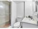 Standard bathroom featuring a shower stall, toilet and vanity with sink at 3512 Haines N Rd, St Petersburg, FL 33704