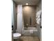 The bathroom features a shower with a bathtub and a towel rack at 36750 Us Highway 19 N # 17-111, Palm Harbor, FL 34684