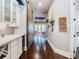 Hallway with a barn door, wine storage, and hardwood floors at 415 5Th N St, Safety Harbor, FL 34695