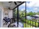 Serene screened balcony offering tranquil water views and comfortable seating at 4212 126Th W St # 401, Cortez, FL 34215