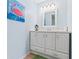 Bathroom with a crab painting above the sink at 4212 126Th W St # 401, Cortez, FL 34215