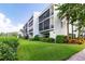 Three-story waterfront condo with spacious balcony, providing a serene outdoor living space at 4212 126Th W St # 401, Cortez, FL 34215