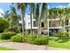 Condominium building featuring a carport, and outdoor balconies at 4212 126Th W St # 401, Cortez, FL 34215
