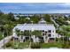 Three story condo complex with mature trees and lush landscaping at 4212 126Th W St # 401, Cortez, FL 34215