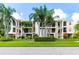 Multi-story condo with expansive balconies, well-manicured lawns, and lush landscaping at 4212 126Th W St # 401, Cortez, FL 34215