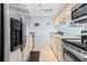 Modern kitchen with stainless steel appliances and ample counter space at 4212 126Th W St # 401, Cortez, FL 34215