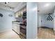 Bright kitchen with stainless steel appliances and modern track lighting at 4212 126Th W St # 401, Cortez, FL 34215