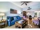 Open-concept living room with a view of the dining area and kitchen at 4212 126Th W St # 401, Cortez, FL 34215