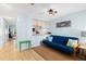 Cozy living area with a comfortable futon and adjacent kitchen counter seating at 4212 126Th W St # 401, Cortez, FL 34215