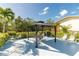 Outdoor patio area with a gazebo, comfortable seating, and a grill, ideal for outdoor gatherings at 4212 126Th W St # 401, Cortez, FL 34215
