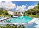 Beautiful in-ground pool with a spacious deck and lounge chairs, perfect for relaxation and enjoyment at 4212 126Th W St # 401, Cortez, FL 34215