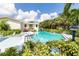 Beautiful pool with a well-maintained deck and lush landscaping, offering a private oasis at 4212 126Th W St # 401, Cortez, FL 34215
