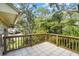 Private balcony overlooking lush trees and landscape at 4421 W Sevilla St, Tampa, FL 33629