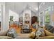 Living Room with high ceilings, fireplace, and hardwood floors at 4421 W Sevilla St, Tampa, FL 33629