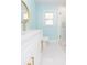 Bright bathroom with white vanity and gold accents at 4643 Bay Crest Dr, Tampa, FL 33615