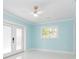 Light and airy bedroom with french doors leading to patio at 4643 Bay Crest Dr, Tampa, FL 33615