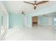 Open living area featuring high ceilings and tile floors at 4643 Bay Crest Dr, Tampa, FL 33615