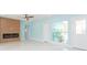 Bright living room with fireplace and light tile floors at 4643 Bay Crest Dr, Tampa, FL 33615