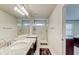 Well-lit bathroom with double granite vanity, glass enclosed shower, and sleek fixtures creates a spa-like retreat at 4925 White Sanderling Ct, Tampa, FL 33619