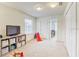 Bonus room is well-lit and includes closet space and toys at 4925 White Sanderling Ct, Tampa, FL 33619