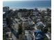 Aerial view of a residential neighborhood near a beach and ocean at 50 Acacia St, Clearwater Beach, FL 33767