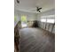 View of bedroom showing demolition, and hardwood floor at 50 Acacia St, Clearwater Beach, FL 33767