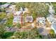 Aerial view of neighborhood with the house outlined in red, surrounded by other homes and lush greenery at 5308 Ben Hur Dr, St Petersburg, FL 33708