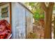 This is a backyard shed featuring metal siding, single door entry, and is surrounded by dense tree coverage at 5308 Ben Hur Dr, St Petersburg, FL 33708