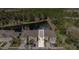 Aerial close-up of a townhome featuring a private driveway and entrance within a well-maintained community at 5507 Cumberland Star Ct, Lutz, FL 33558