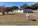 An expansive front yard with a mailbox stands before the well-maintained, single-story residence at 5729 13Th St, Zephyrhills, FL 33542