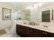 Bathroom boasts double vanities and ample lighting at 6105 Mirada Cir, St Petersburg, FL 33715