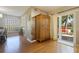 Bright and airy living room with hardwood floors and sliding glass doors to the patio at 6105 Mirada Cir, St Petersburg, FL 33715