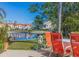 Outdoor patio features a table and chairs, offering beautiful water views at 6105 Mirada Cir, St Petersburg, FL 33715