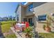 Cozy back patio features a dining table and chairs for outdoor relaxation at 6105 Mirada Cir, St Petersburg, FL 33715