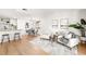 Inviting living room connected to the dining area, featuring stylish furnishings and natural light at 6121 38Th W Ave, Bradenton, FL 34209