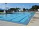 Sparkling swimming pool featuring lap lanes, lifeguard stand and comfortable seating at 6121 38Th W Ave, Bradenton, FL 34209