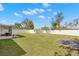 Large, fenced backyard offering plenty of green space for outdoor activities at 6426 Gondola Dr, Riverview, FL 33578