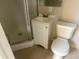 Practical bathroom with a shower, white vanity, and tiled floors at 6601 65Th N Way, Pinellas Park, FL 33781