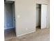 Comfortable bedroom with neutral carpet and a closet with sliding doors at 6601 65Th N Way, Pinellas Park, FL 33781