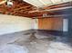 Spacious garage featuring a concrete floor and exposed ceiling at 6601 65Th N Way, Pinellas Park, FL 33781