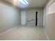 Well-lit laundry room featuring tile flooring and laundry hookups at 6601 65Th N Way, Pinellas Park, FL 33781