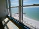 Ocean view with built in seat near a window at 7000 Beach Plz # 805, St Pete Beach, FL 33706