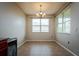 Cozy dining room with chandelier lighting and a large window at 7304 63Rd E Ct, Palmetto, FL 34221