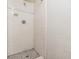 Shower featuring white tiling and a tiled floor at 9121 Prosperity Ln, Port Richey, FL 34668