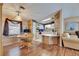 Open-concept dining area with wood-look floors connecting to the kitchen and living spaces at 9417 Star Gazer Ln, Riverview, FL 33578