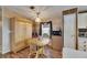 Cozy dining area featuring a round table and chairs beneath a chandelier-style light fixture at 9417 Star Gazer Ln, Riverview, FL 33578