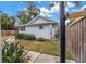 Outdoor shower with modern fixtures and a privacy fence, convenient for rinsing off after a swim in the backyard pool at 1155 23Rd N Ave, St Petersburg, FL 33704